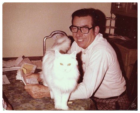1972.. Rob, in the usual excellent reading glasses, and Prudence-the-famous, helping with paperwork.jpg